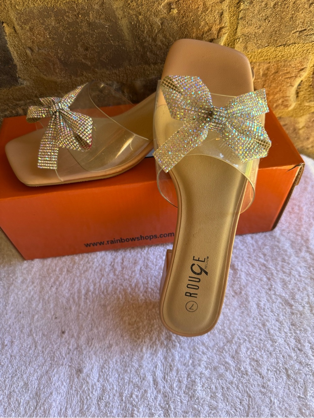 Rouge Helium Nude Slide Sandals with Iridescent Rhinestone Bow